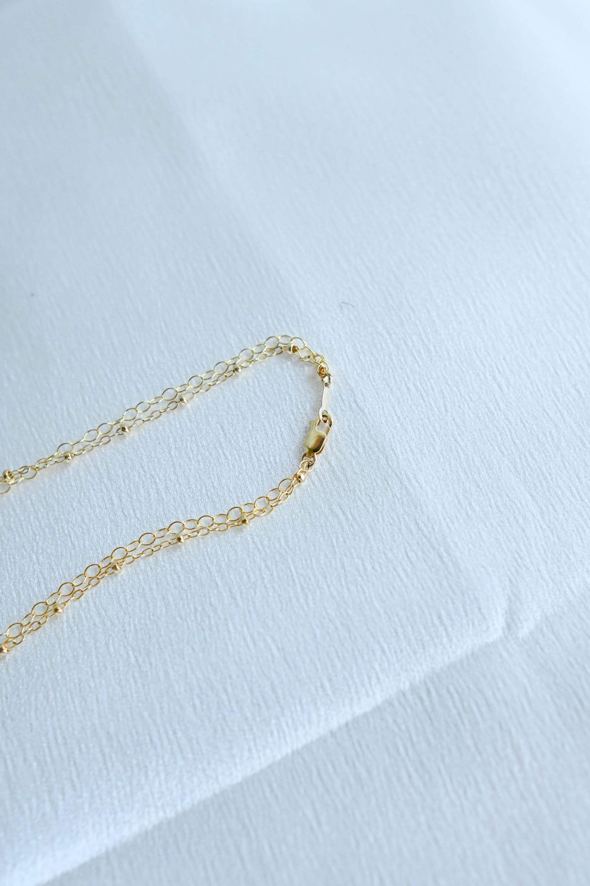 14k Gold Filled Tahitian 8mm Pearl necklace layered with satellite chain (etsy image id: 7870787863)