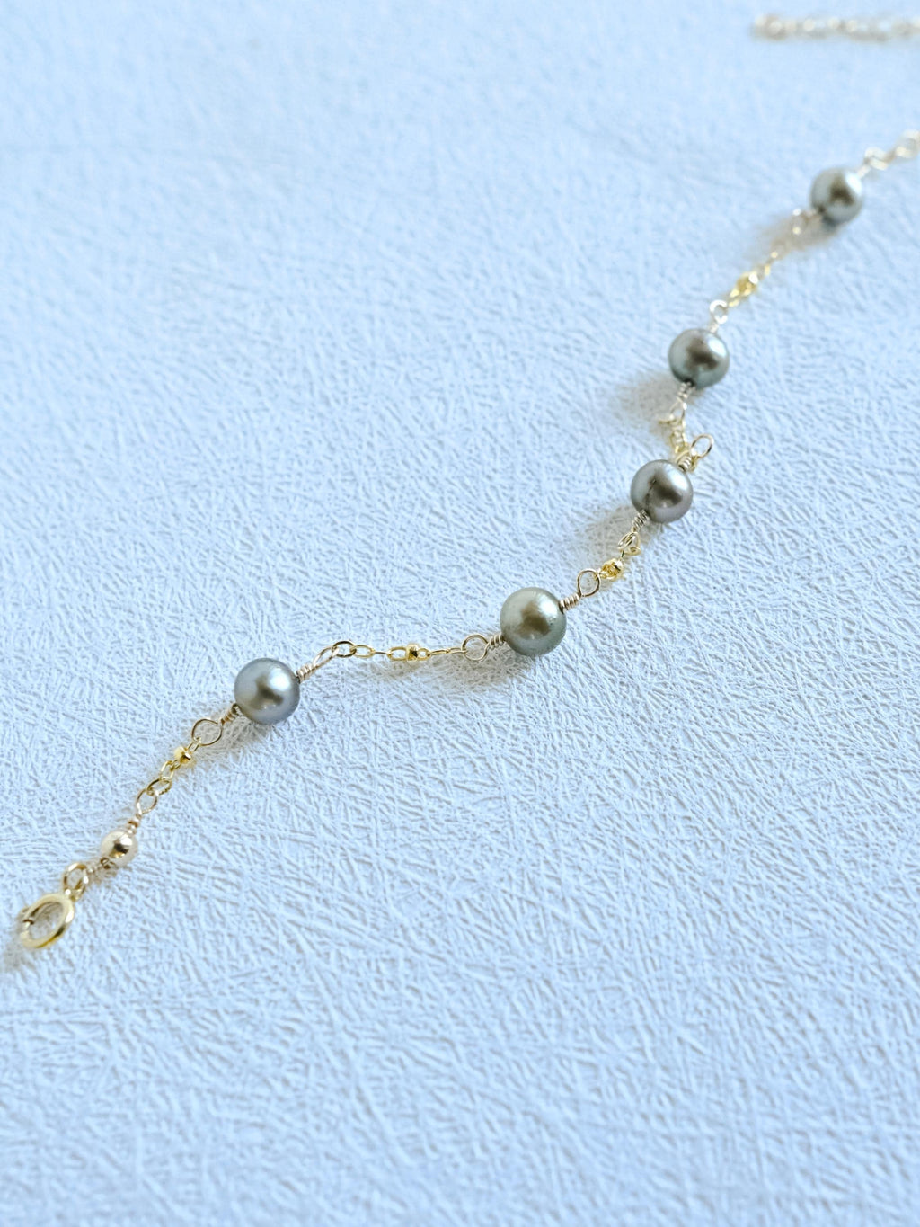 Gold Filled satellite cable chain bracelet with green freshwater pearls (etsy image id: 7906263240)