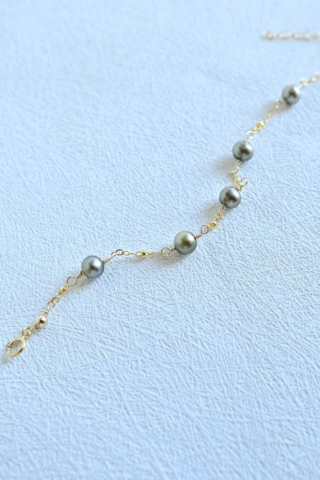 Gold Filled satellite cable chain bracelet with green freshwater pearls (etsy image id: 7954219383)