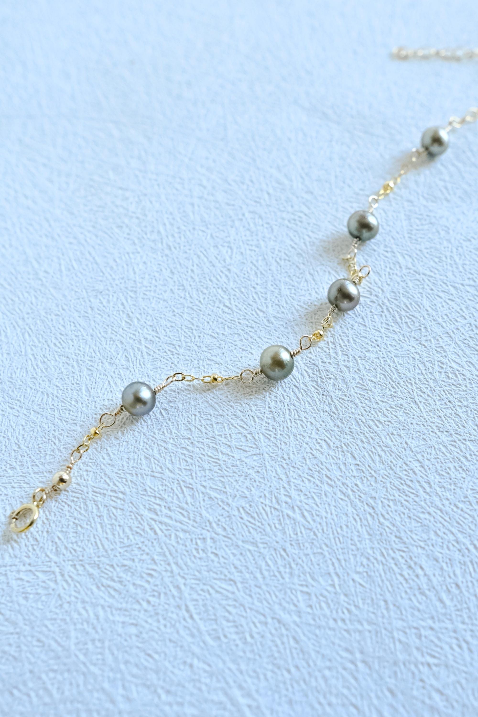 Gold Filled satellite cable chain bracelet with green freshwater pearls (etsy image id: 7954219383)