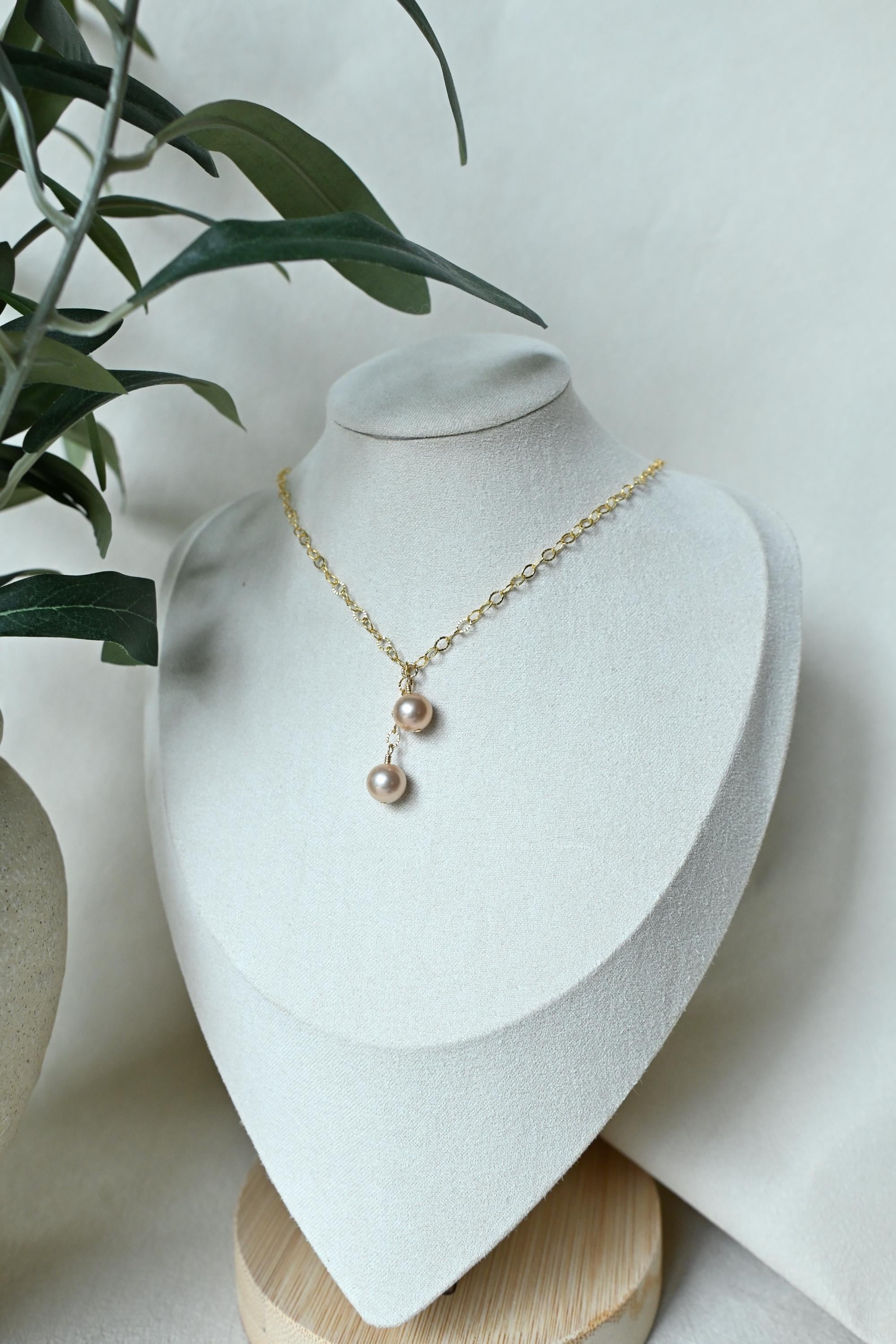 Dangle Peach Edison pearl necklace with two pearls (etsy image id: 8008017786)