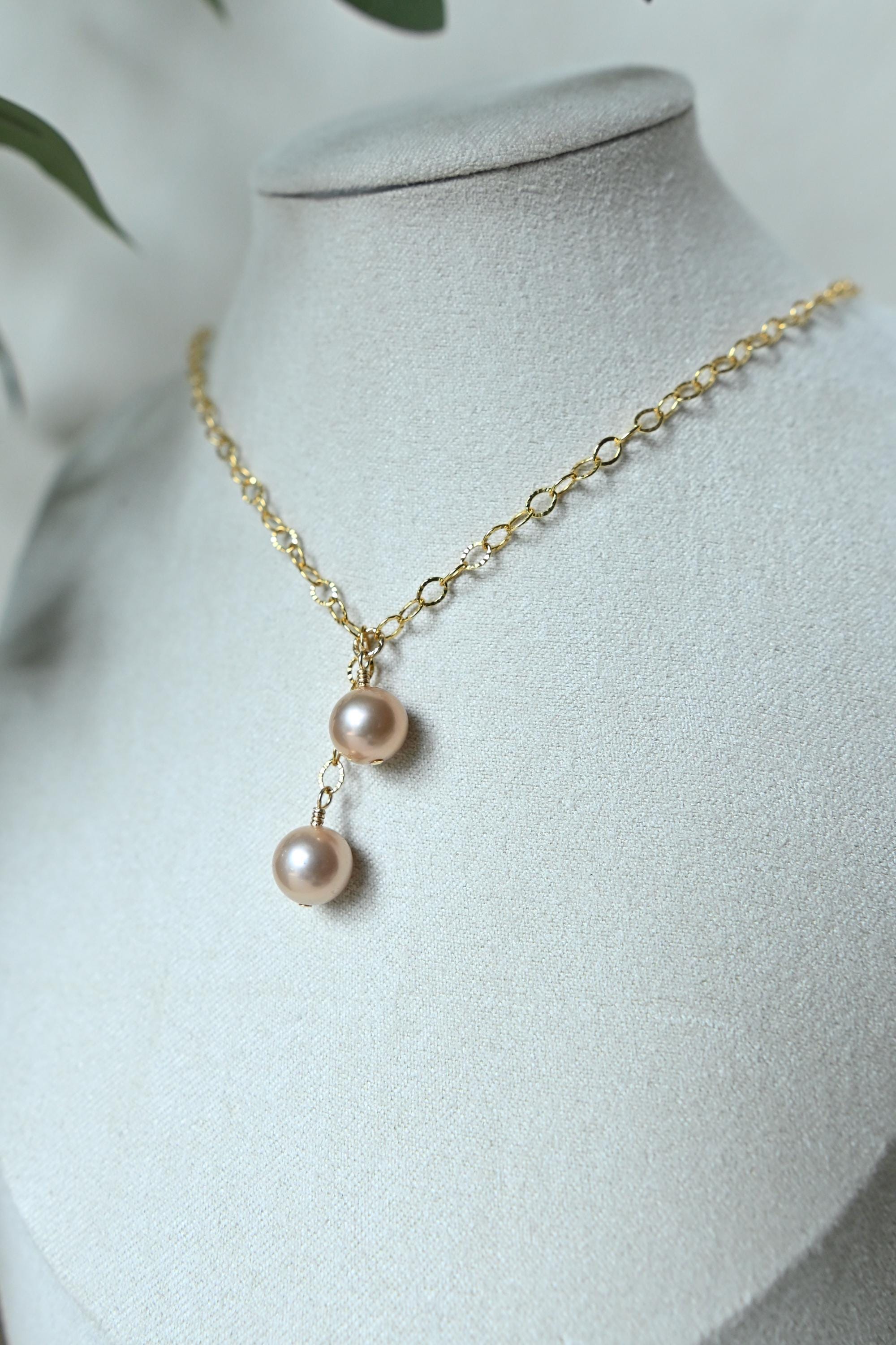 Dangle Peach Edison pearl necklace with two pearls (etsy image id: 8008018006)