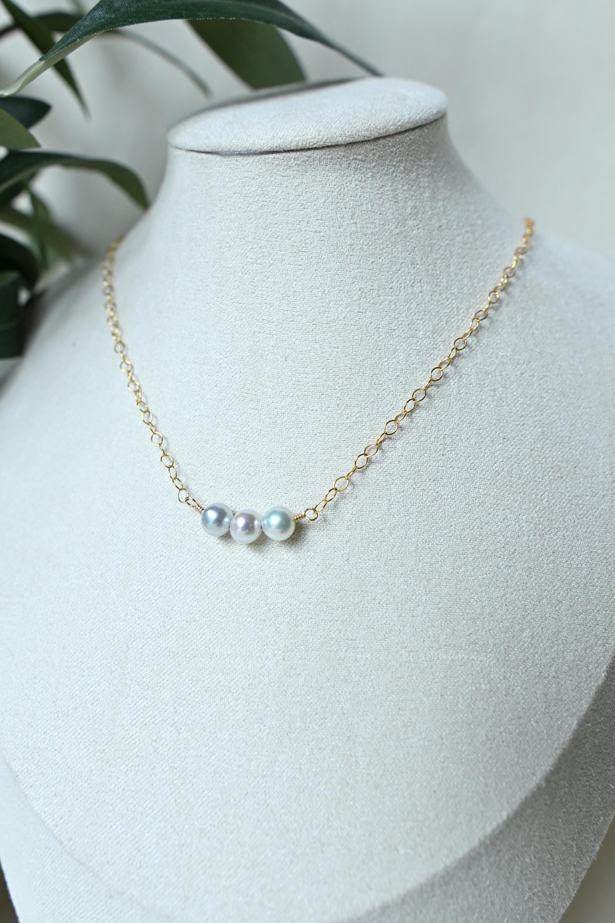 Round silver/white Akoya pearl necklace (etsy image id: 8008033866)
