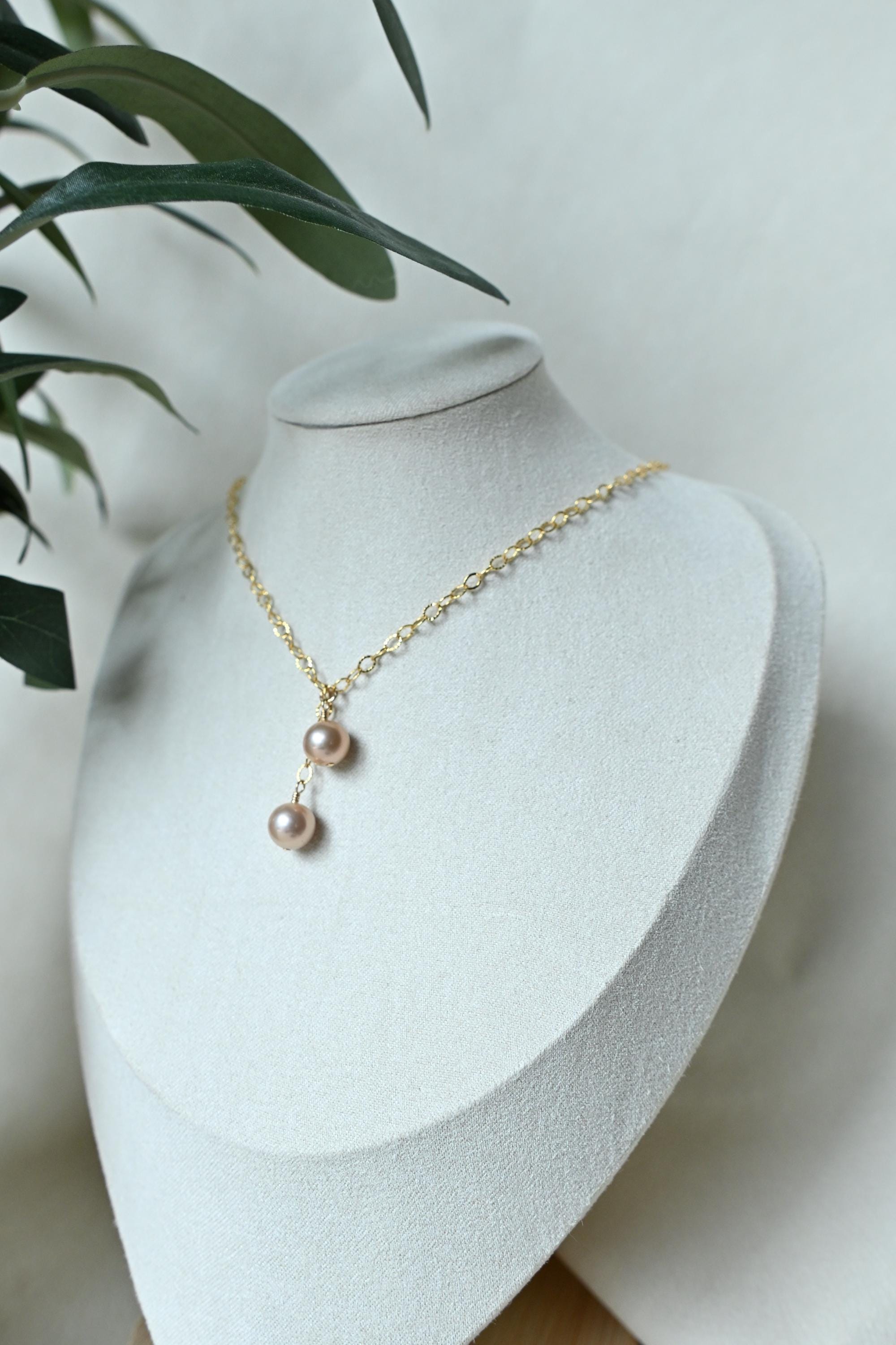 Dangle Peach Edison pearl necklace with two pearls (etsy image id: 8055932757)