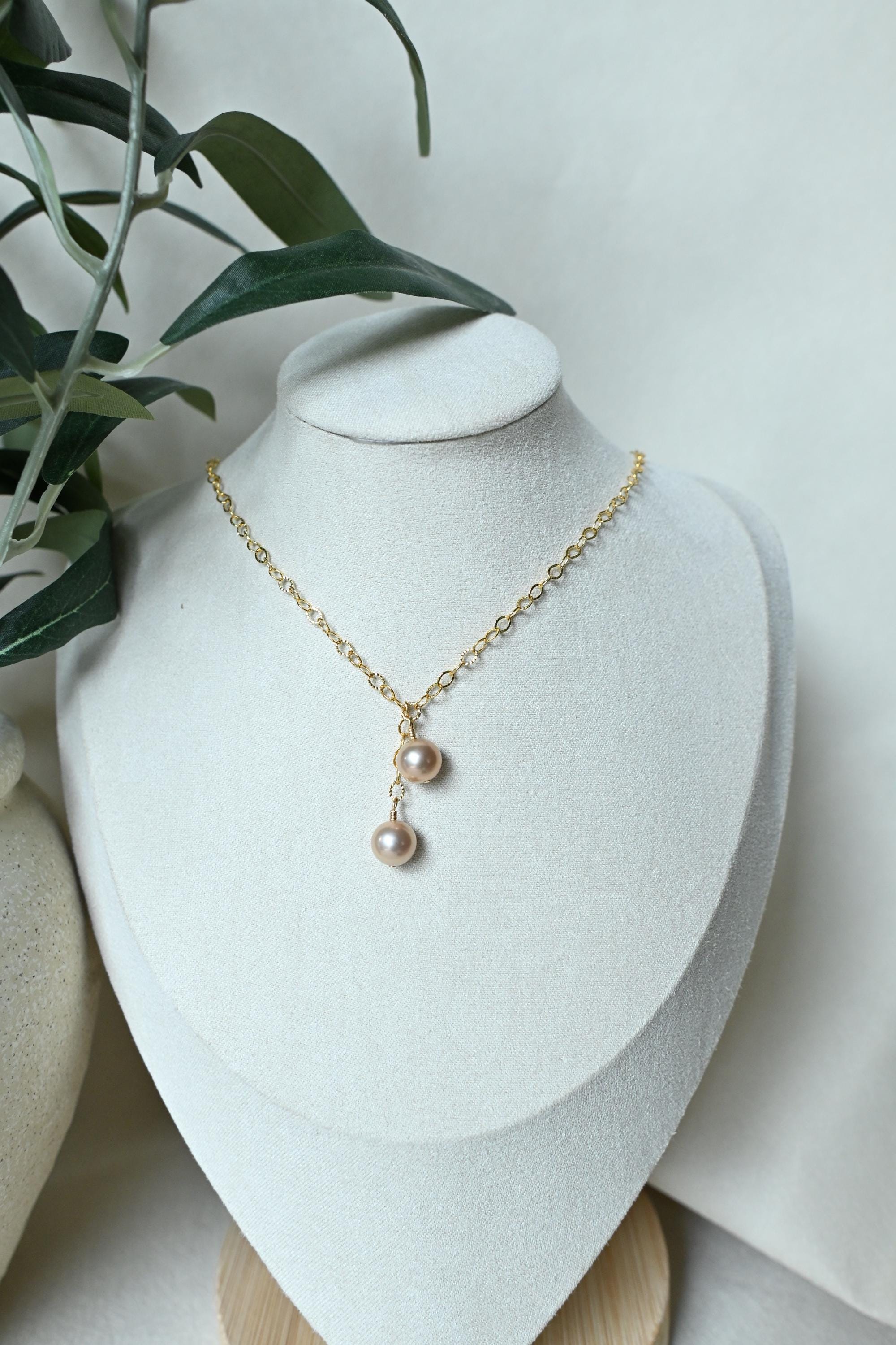 Dangle Peach Edison pearl necklace with two pearls (etsy image id: 8055933021)